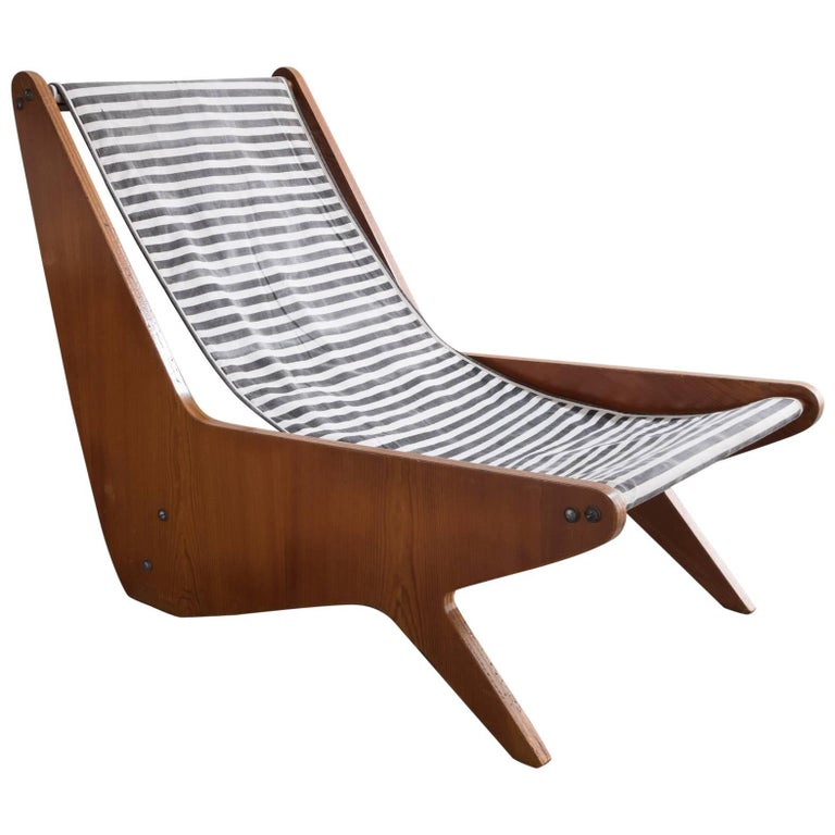 José Zanine Caldas plywood lounge chair, 1950s, offered by R & Company