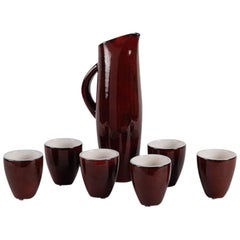 Pol Chambost, Pitcher and Seven Cups with Red and White Glaze, France, 1972