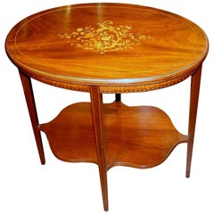 Superbe table d'appoint ovale anglaise ancienne en acajou incrusté de marqueterie