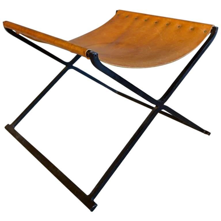 Saddle Leather and Iron X-Base Ottoman, circa 1970