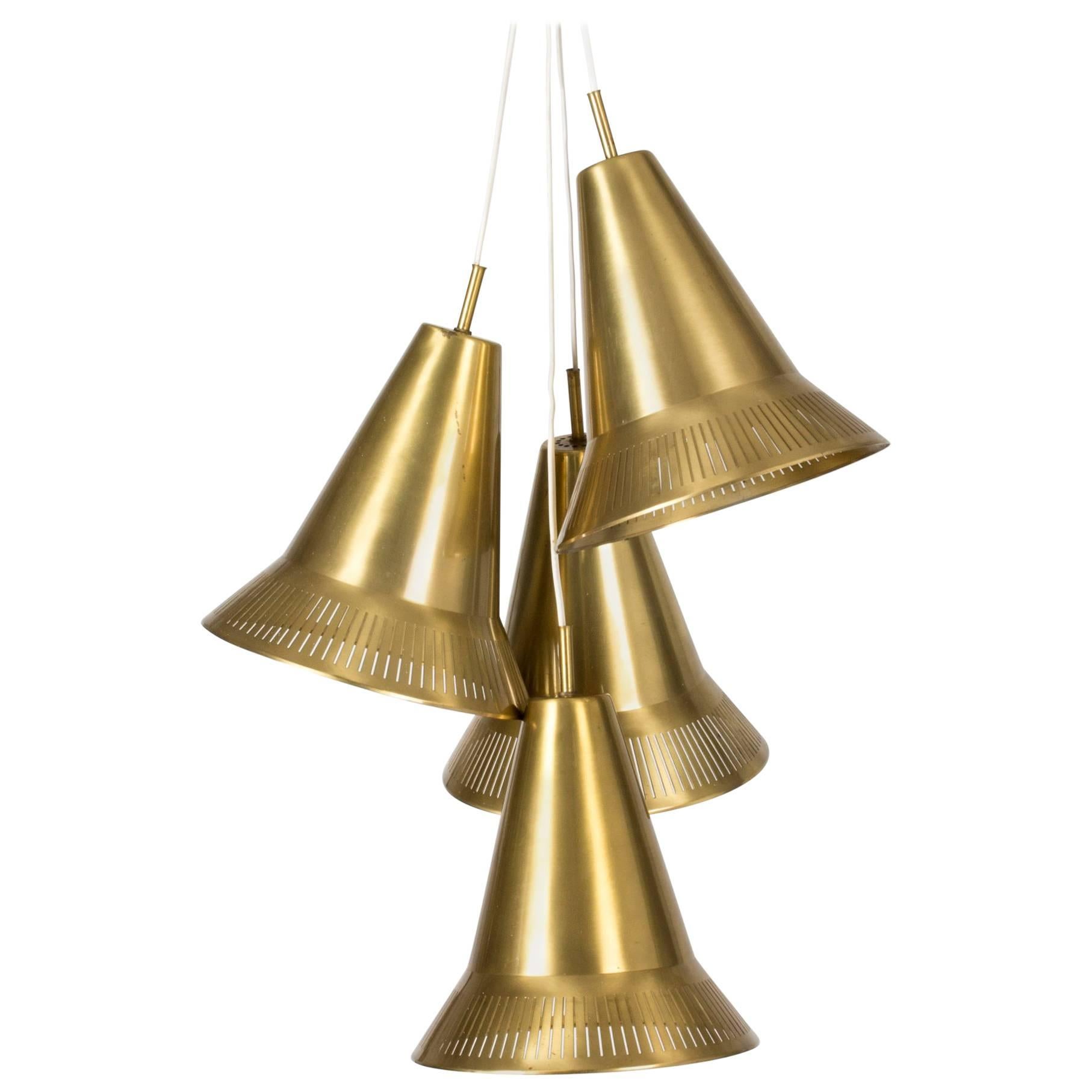 Set of Four Brass Pendant Lamps by Hans Bergström For Sale