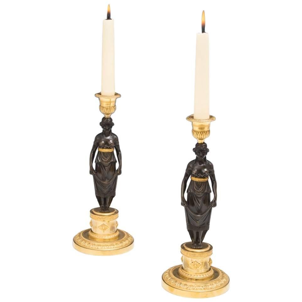 Fine Pair of Ormolu and Bronze Figurine Candlesticks