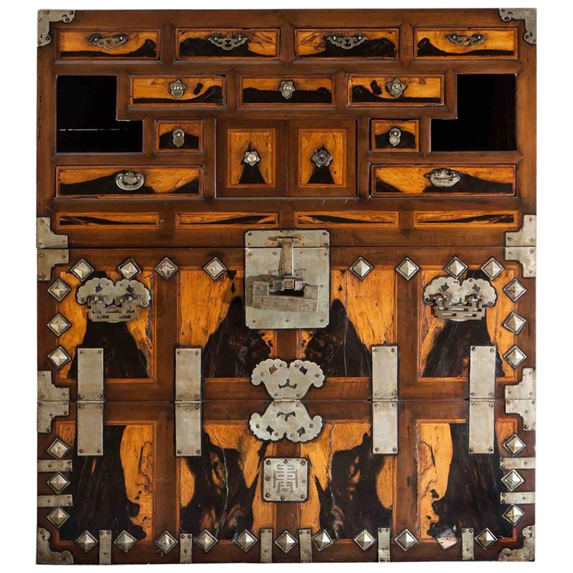 This very rare blanket and document storage chest is made from Persimmon and Zelkova
and was made in Korea in the 18th century.
Size: 17.25 x 40x 46 H

 