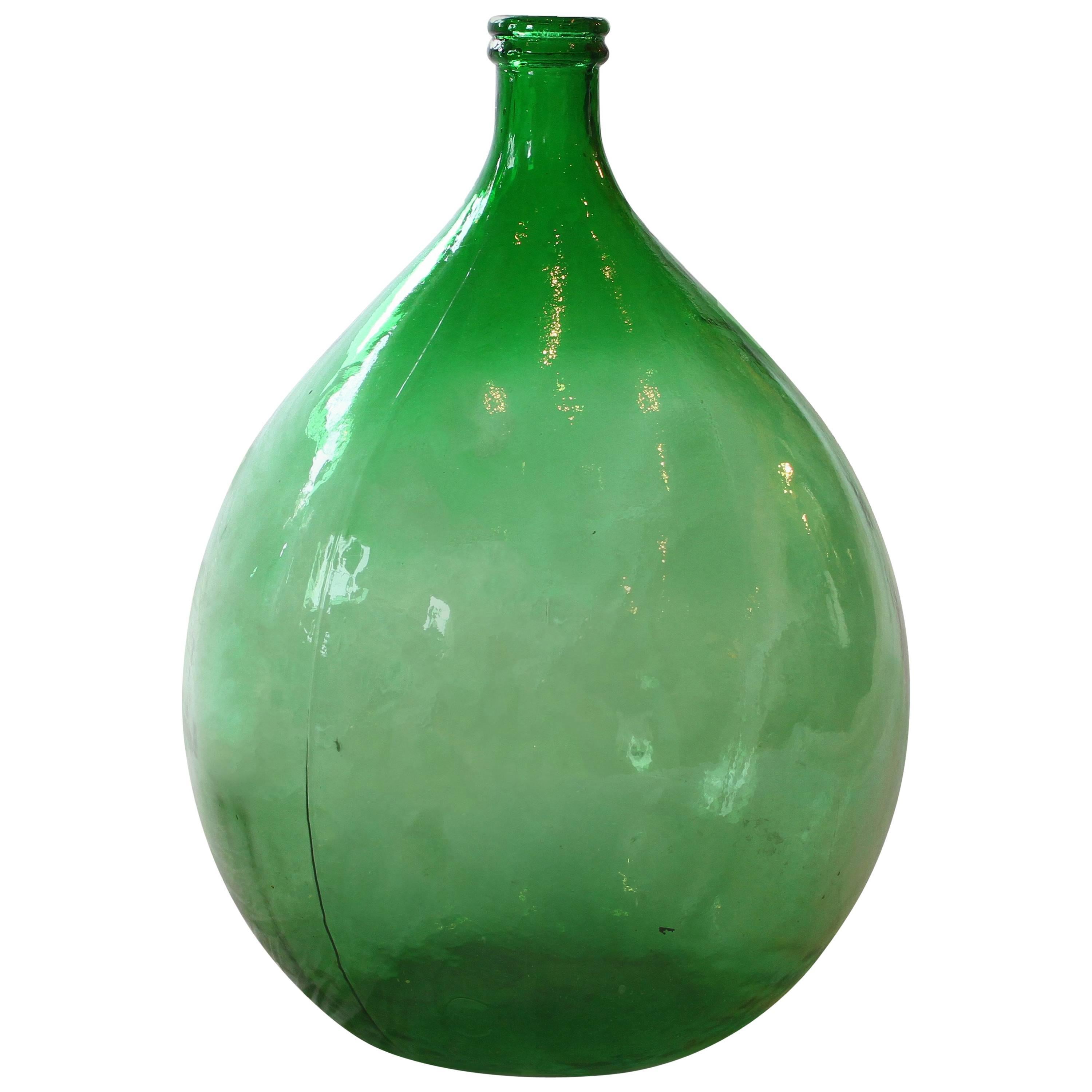 Pair of Italian Green Glass Demijohns For Sale