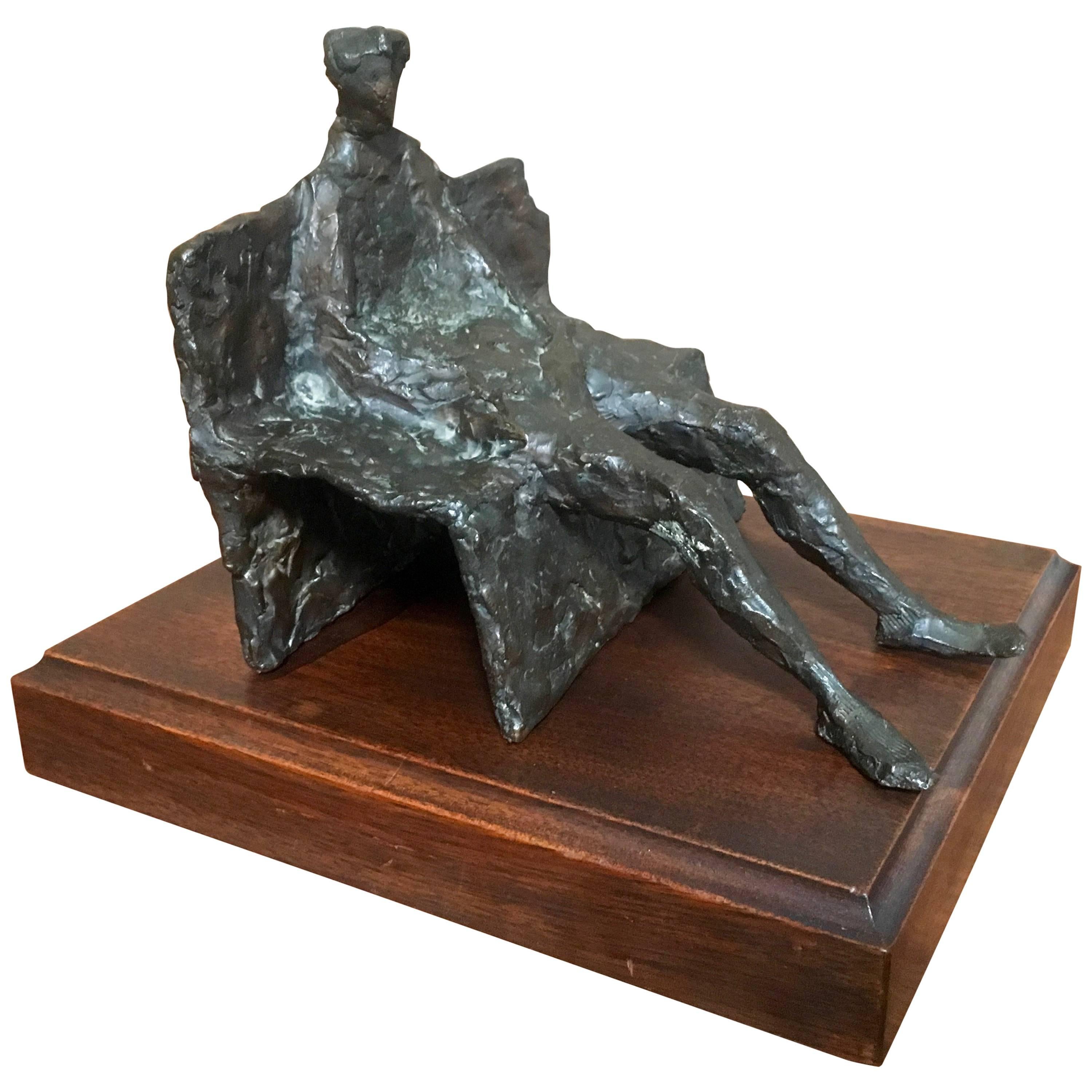 Abstract Bronze Sculpture of Man on a Bench