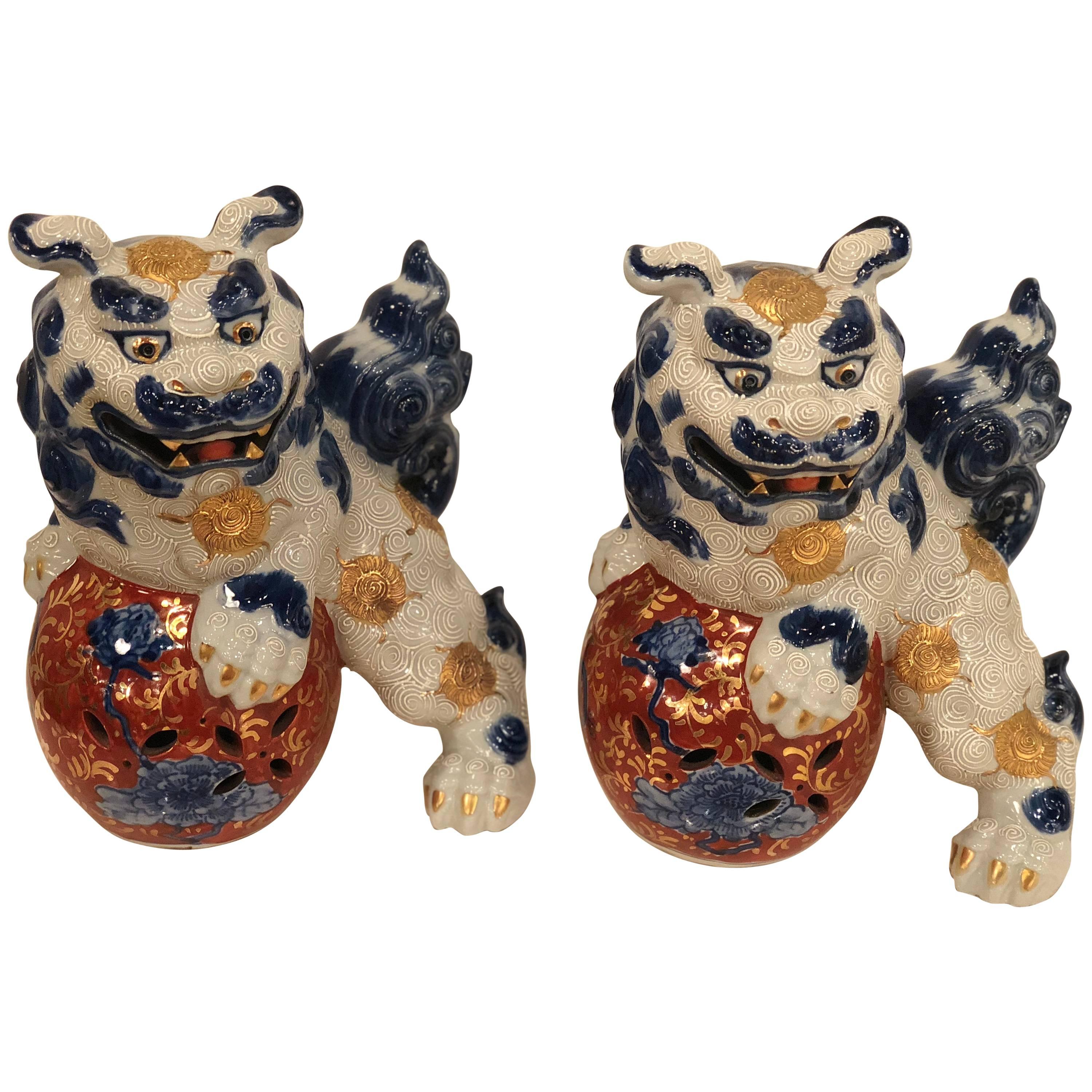 Vintage Pair of Chinoiserie Blue and White Foo Dogs  For Sale