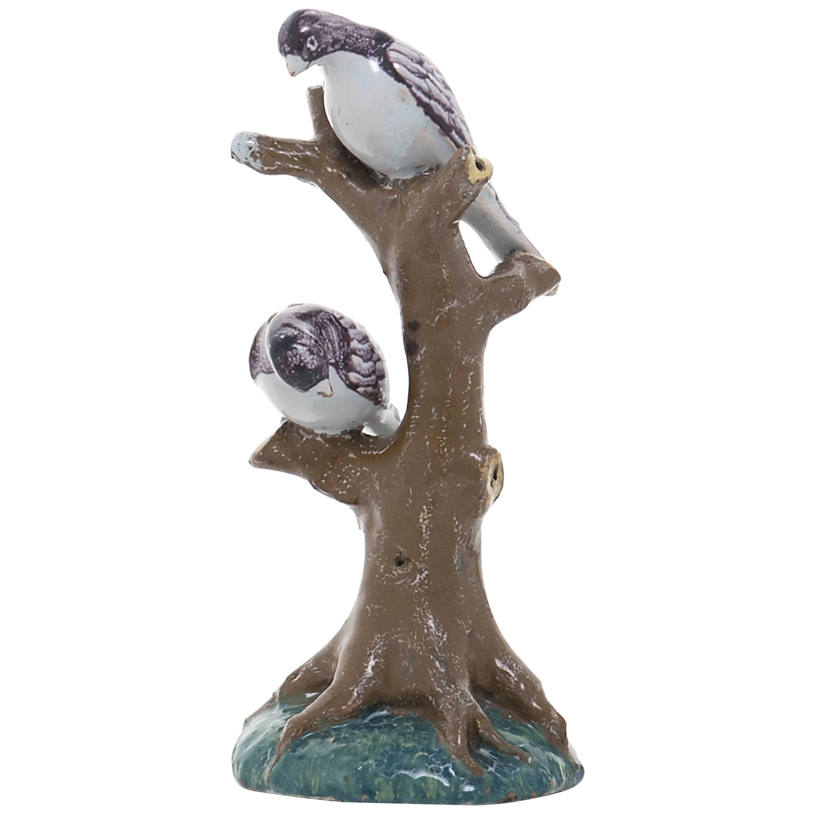 18th Century Dutch Delft Group Depicting Birds Perched on a Tree Trunk For Sale