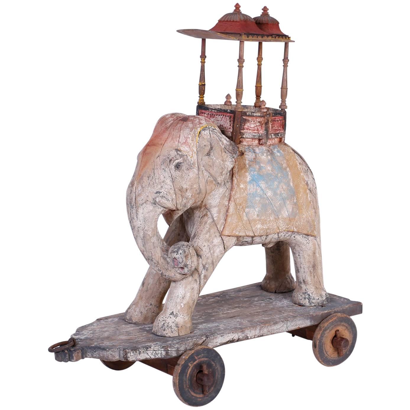 Large Anglo-Indian Carved Wood Elephant on Wheels