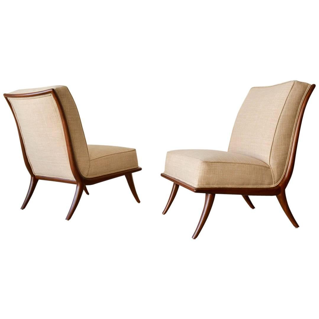 Pair of T. H. Robsjohn-Gibbings Walnut Sabre Leg Slipper Chairs, circa 1950