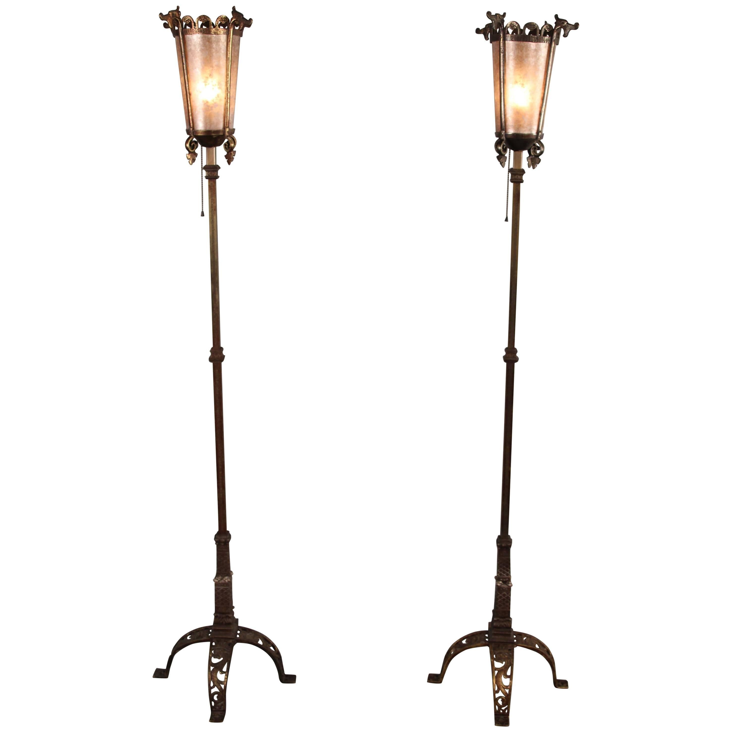 Pair of 1920s Spanish Revival Torchieres with Dragon Motif Attributed Oscar Bach For Sale
