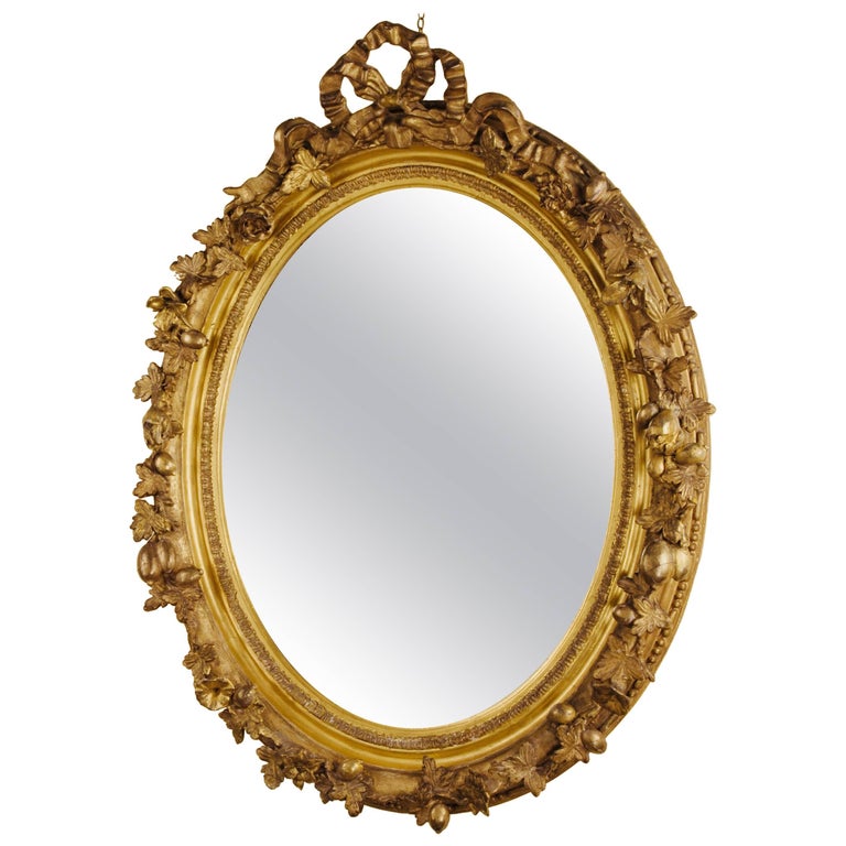 Unusual Adam Oval Giltwood Mirror at 1stdibs