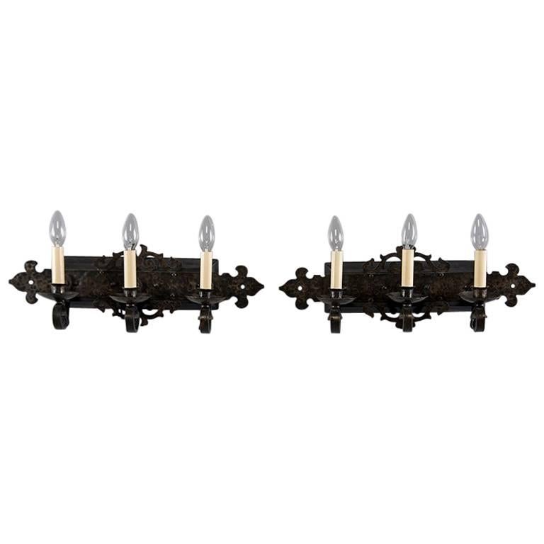 Pair of Arts & Crafts Hammered Black Iron Three-Light Sconces