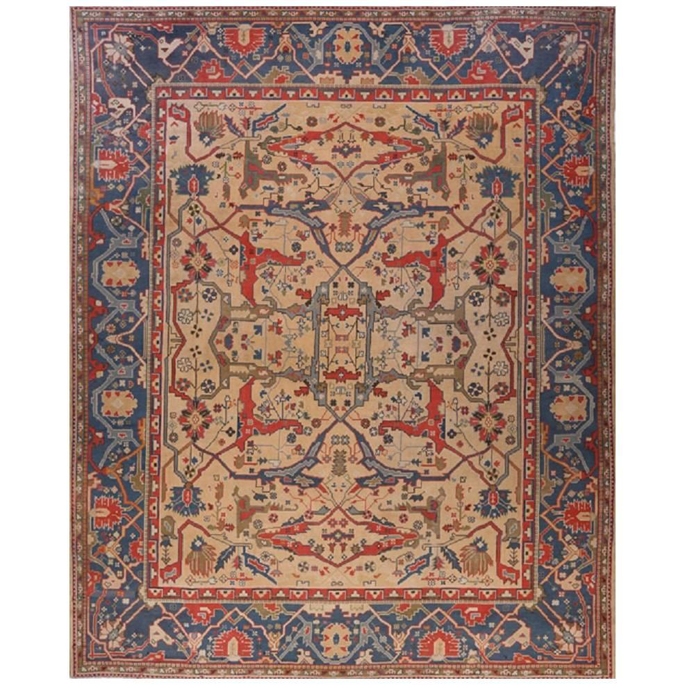 Antique Turkish Oushak circa 1920 in Soft Orange/Red with Scalloped Medallion For Sale