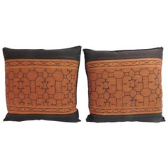 Pair of Graphic Tribal Peruvian Textile in Orange and Black Decorative Pillows