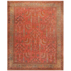 Antique Turkish Oushak, circa 1910, Pink Field with Palmettes and Flowers