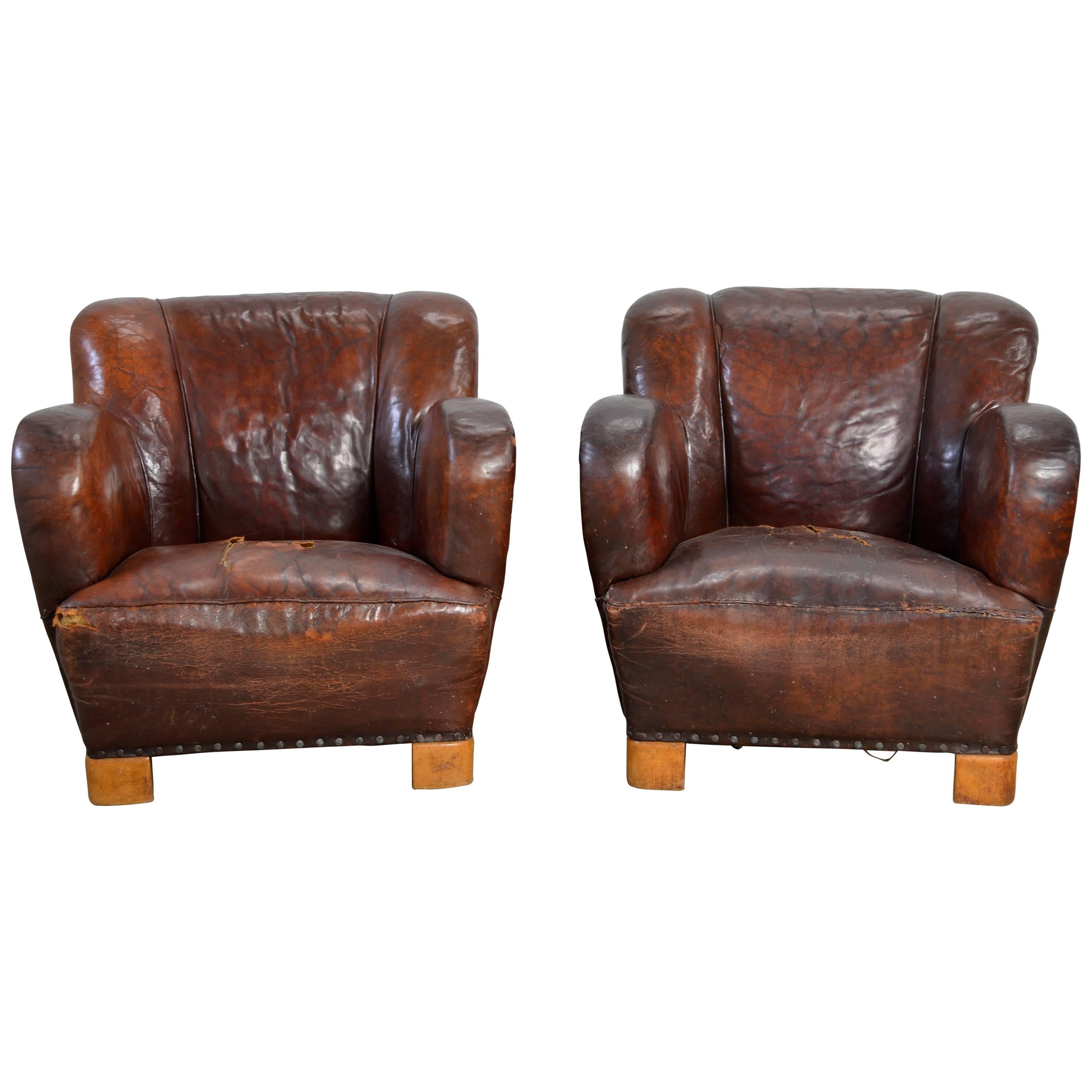 Pair of Early Danish Modern Lounge Chairs in Leather For Sale
