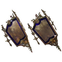 Pair of 1920s Bronze Corner Mount Sconces with Blue Flashed Glass