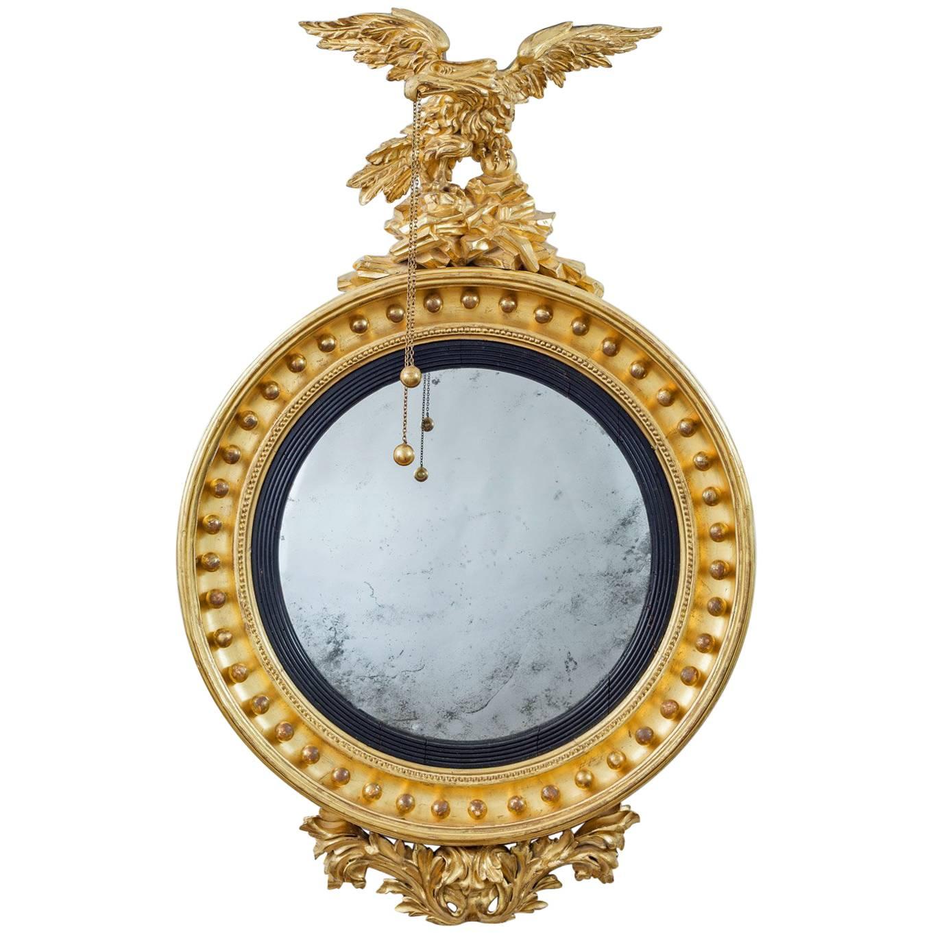 Regency Giltwood Convex Mirror with Eagle For Sale