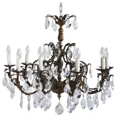 Late 20th Century Ornate Brass Chandelier Dressed in Cut Crystal Drops
