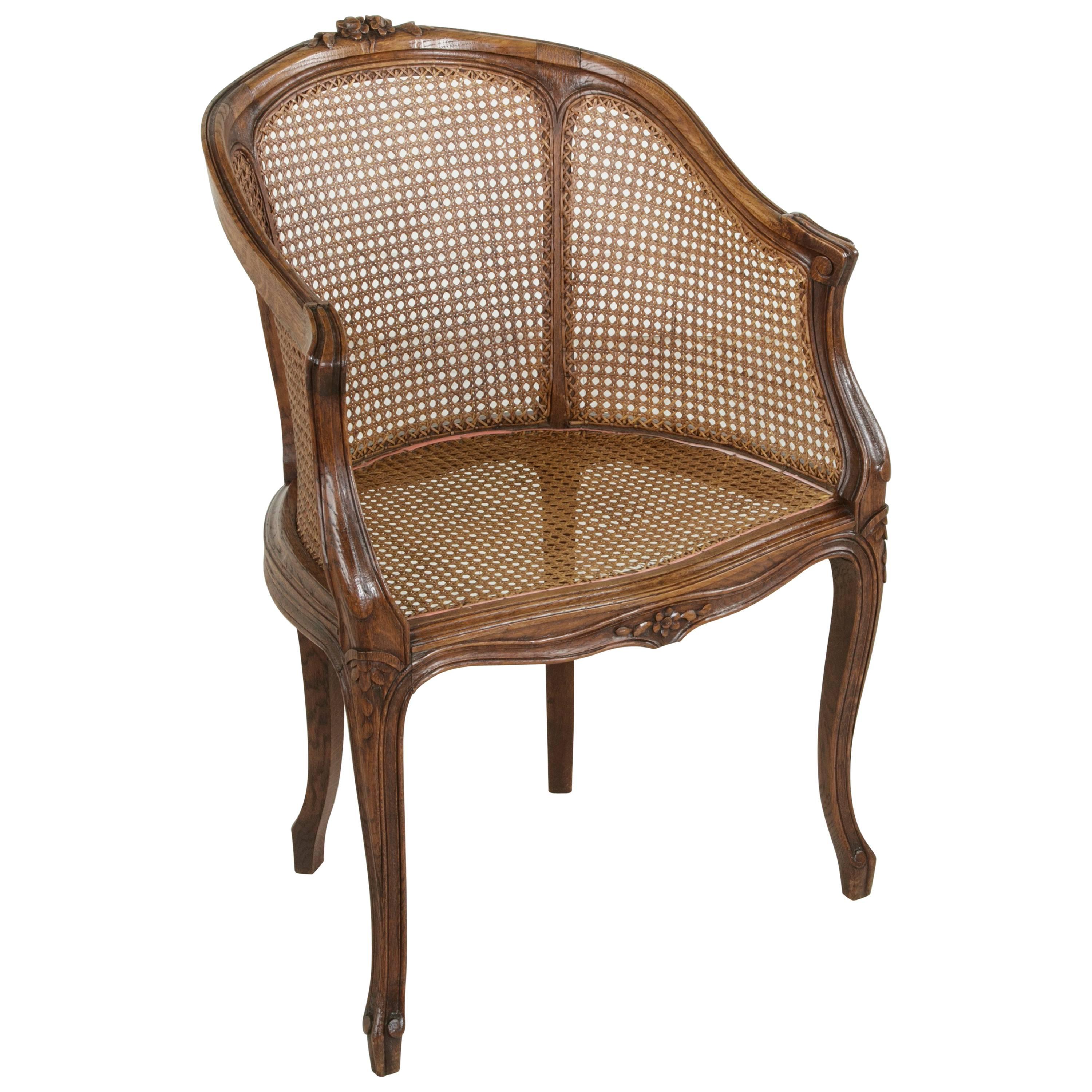 Early 20th Century French Louis XV Style Hand-Carved Oak and Caned Bergere