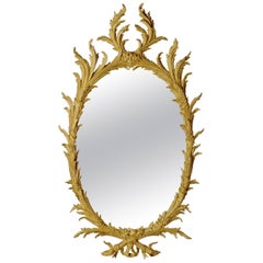 Early George III 18th Century Oval Carved Giltwood Mirror