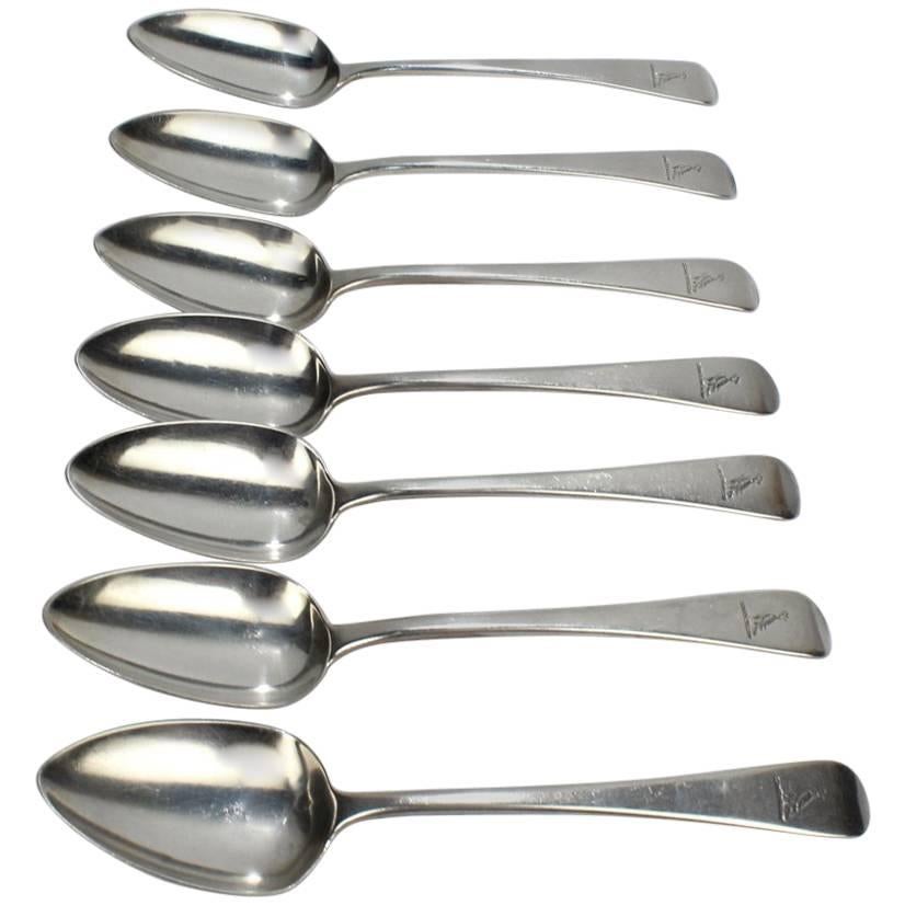 Eight Crested Georgian English Sterling Silver Spoons by William Ely I