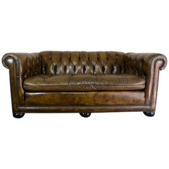 Antique English Leather Tufted Chesterfield Style Loveseat, circa 1930