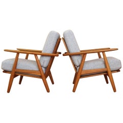 Pair of Hans Wegner Oak 
Cigar
 Lounge Chairs Model GE-240 GETAMA, Denmark