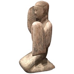 Figura de cerámica gris de la dinastía Han de una bailarina arrodillada de manga larga