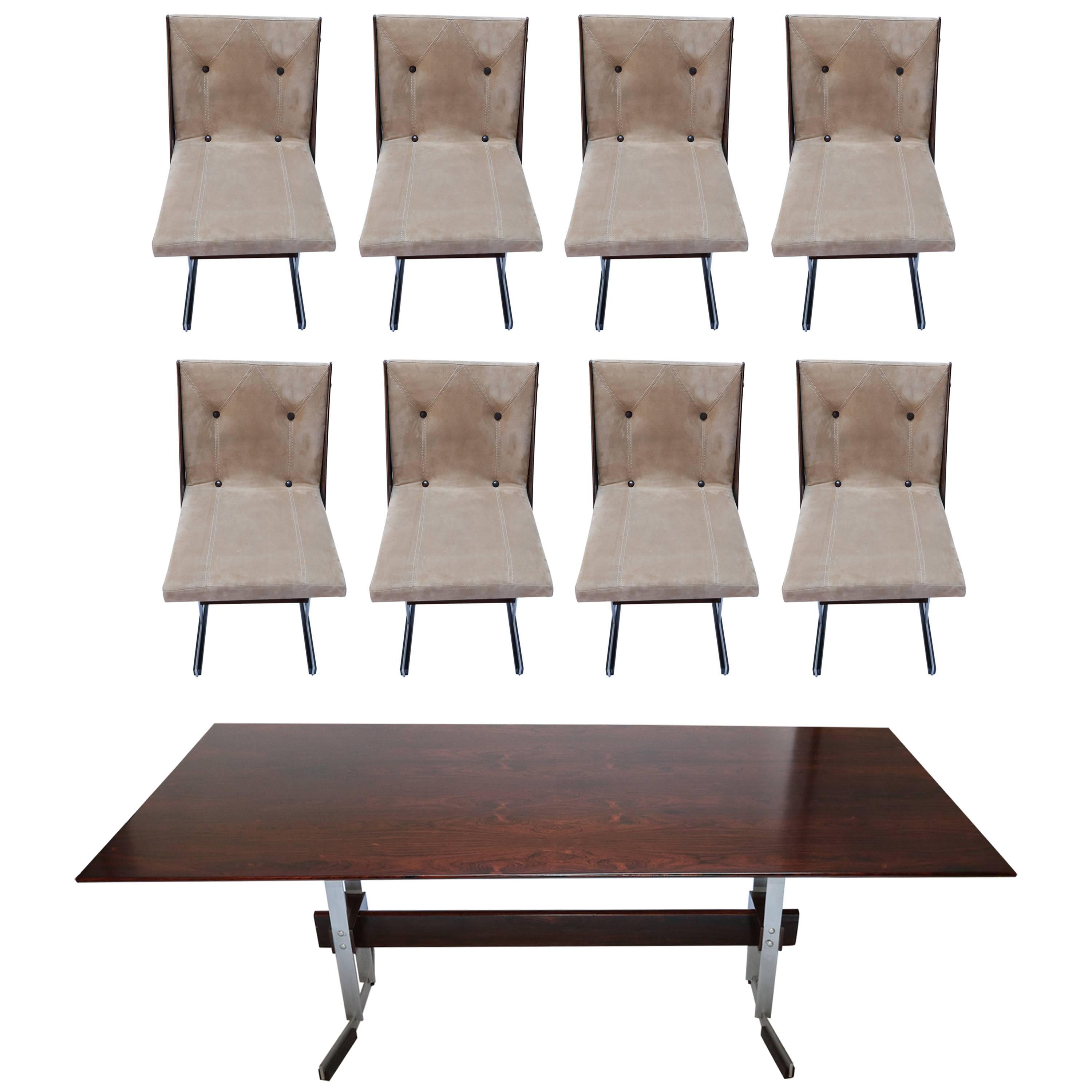 Brazilian jacaranda wood and metal dining table and eight chairs from the 1960s attributed to Jorge Zalszupin, upholstered in beige suede. 

Chair dimensions: 18