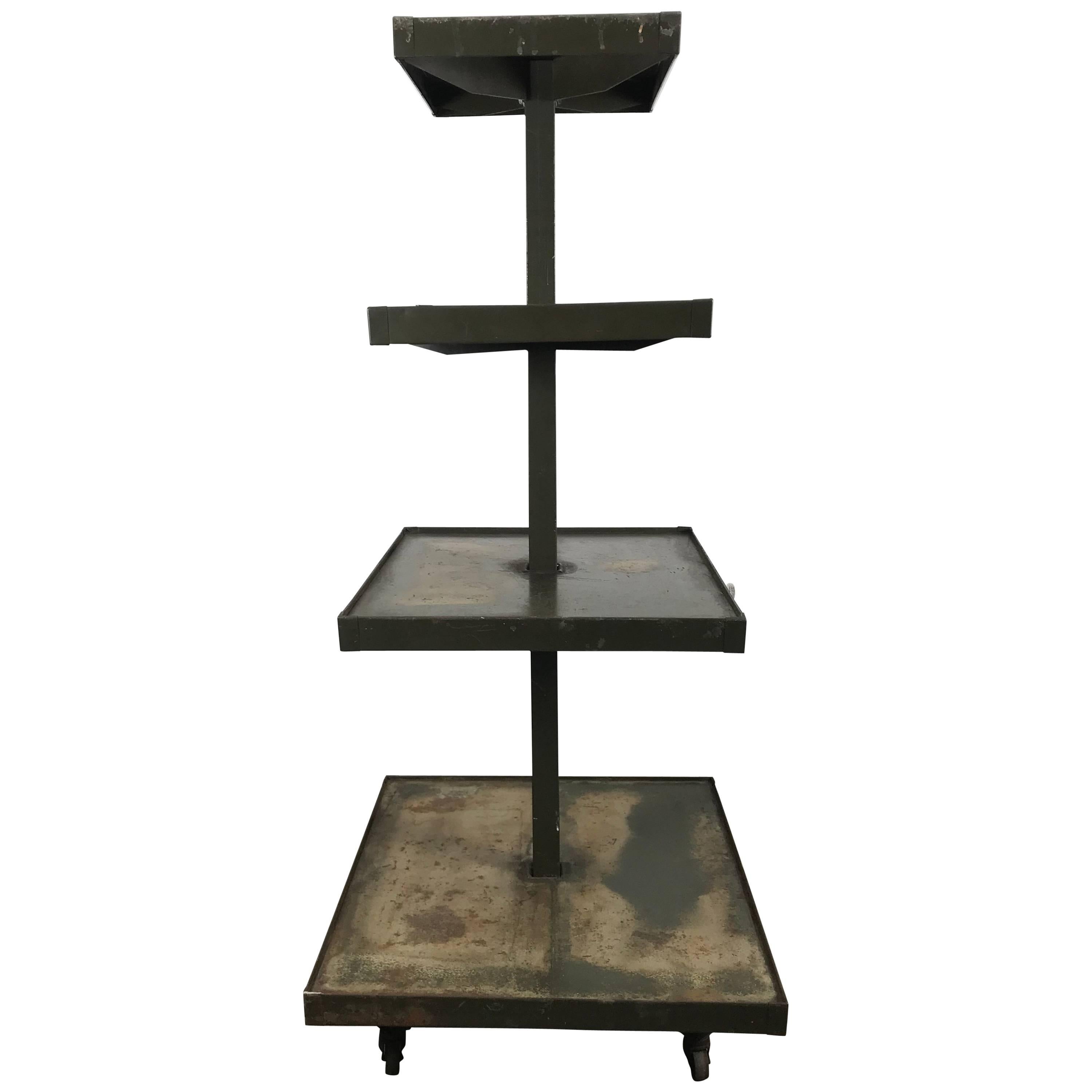 Industrial 4 tier rolling display stand, distressed finish.Dayton Display Co.