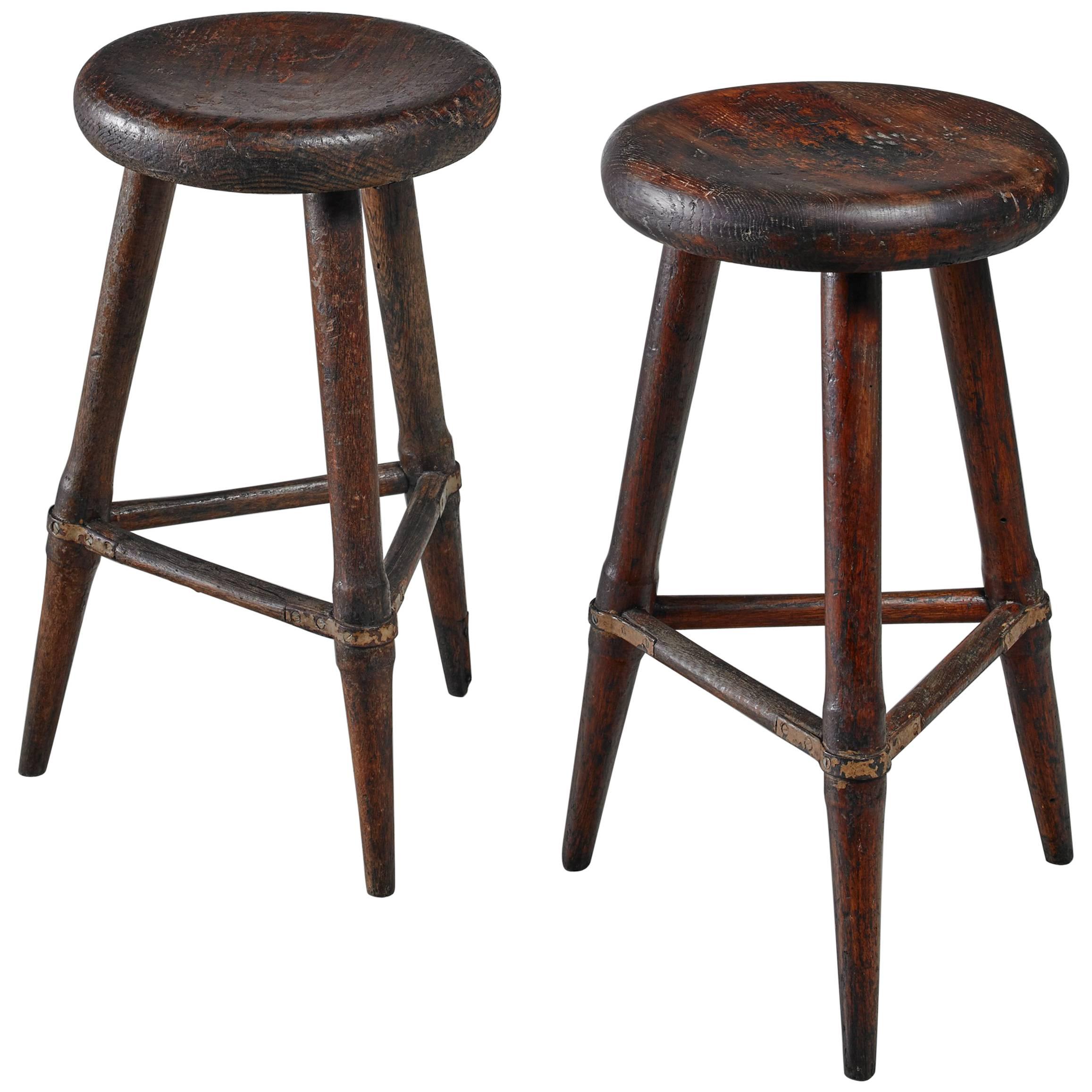 Pair of High Scandinavian Wooden Tripod Stools with Iron Connections, 1930s For Sale