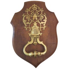 20th Century Brass Door Knocker with Pierced Backplate Mounted on Oak Plaque