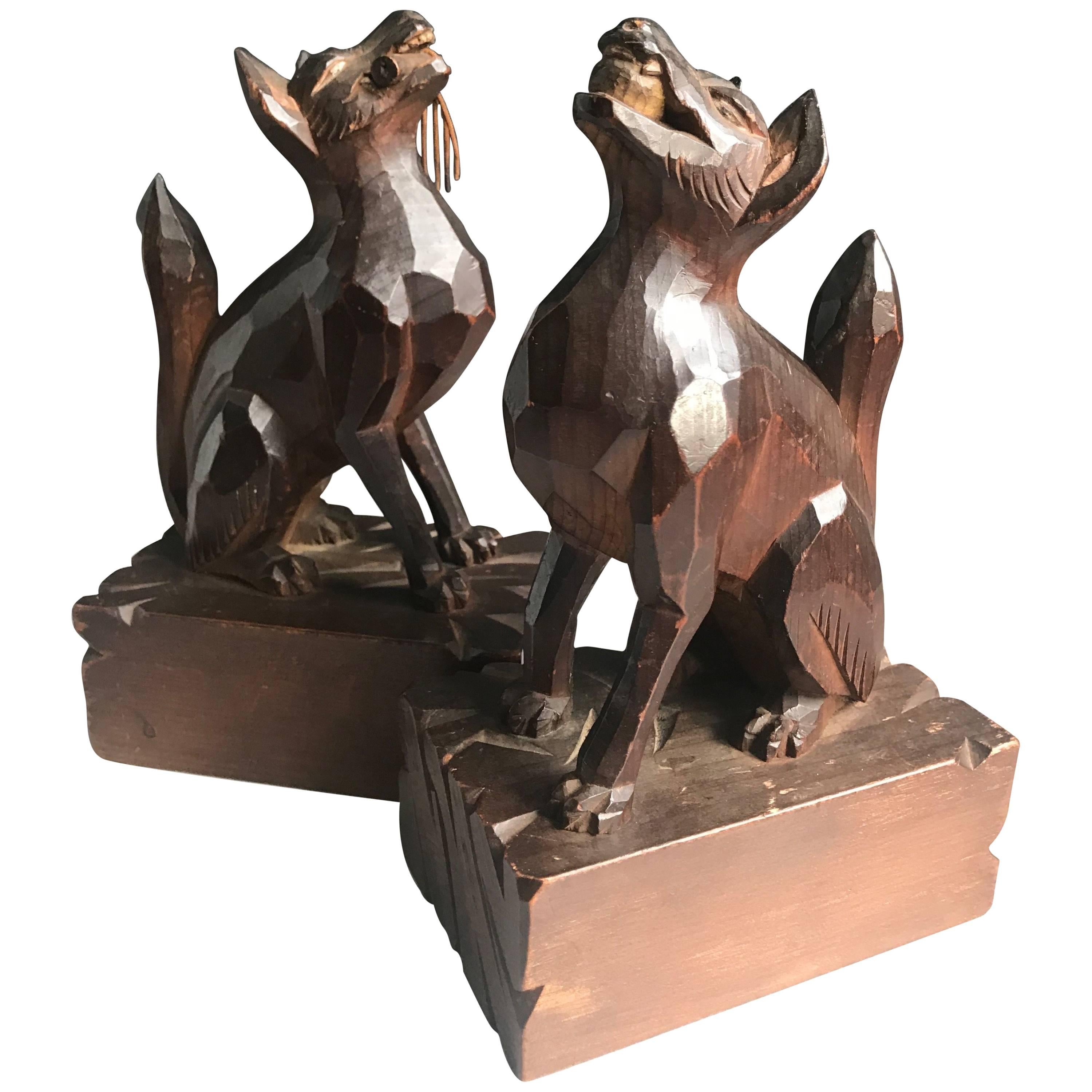 Early 1900 Hand-Carved and Stylized Dogs Playing Fetch Sculptures, Pair Bookends For Sale