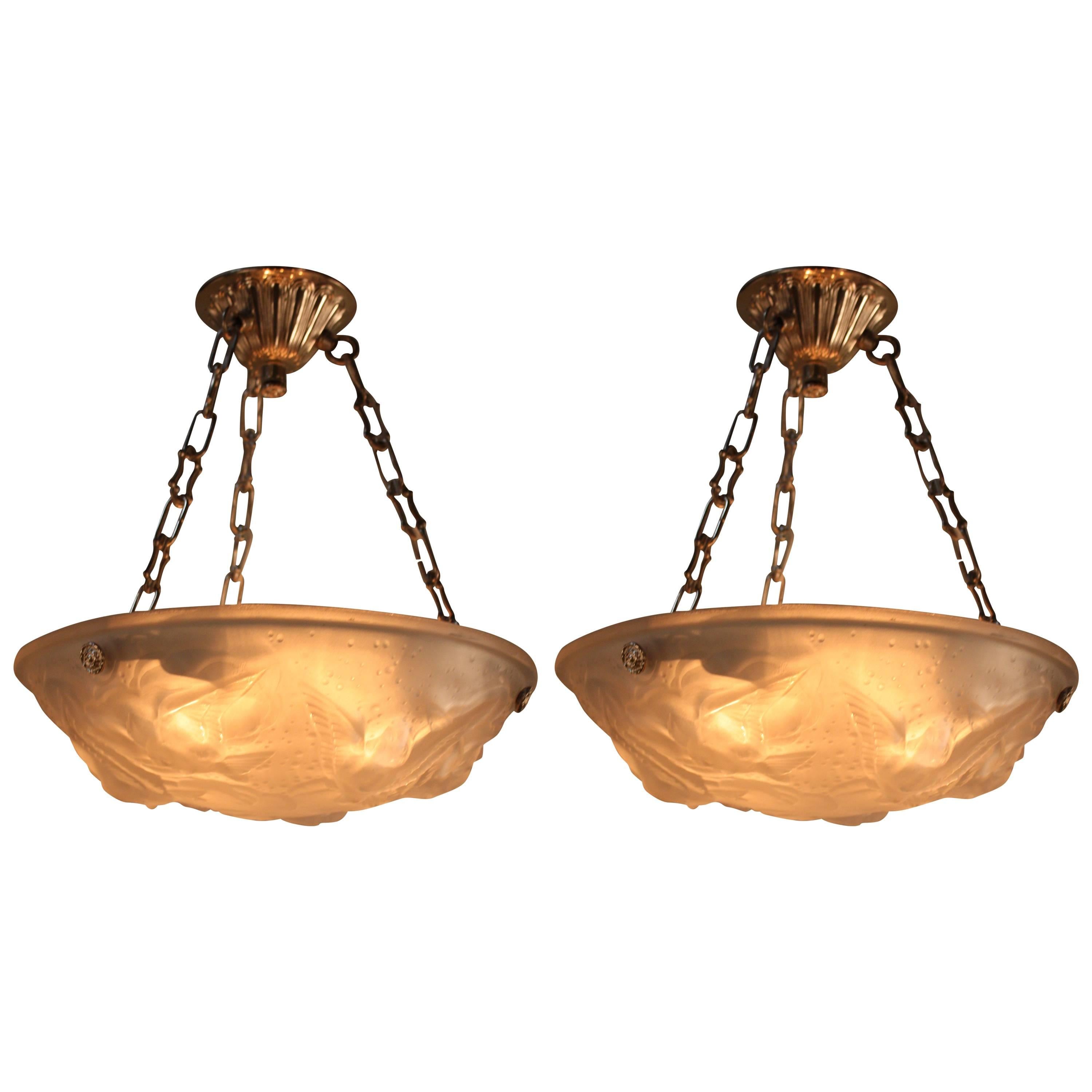 Pair of French Art Deco Flying Bird Pendant Chandeliers by Muller Freres
