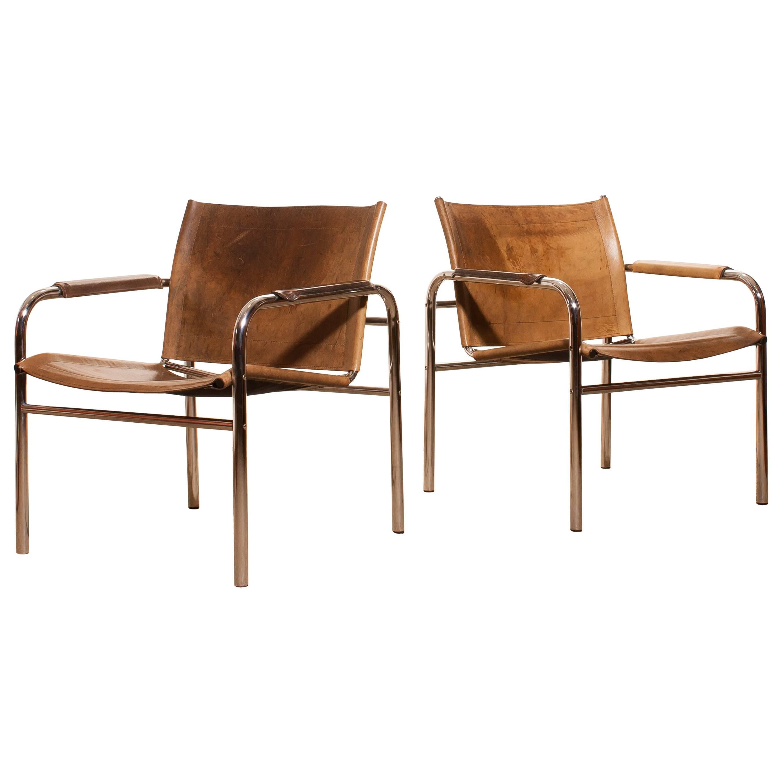 1960s , Two Leather and Tubular Steel Arm Chairs 'Klinte' by Tord Björklund