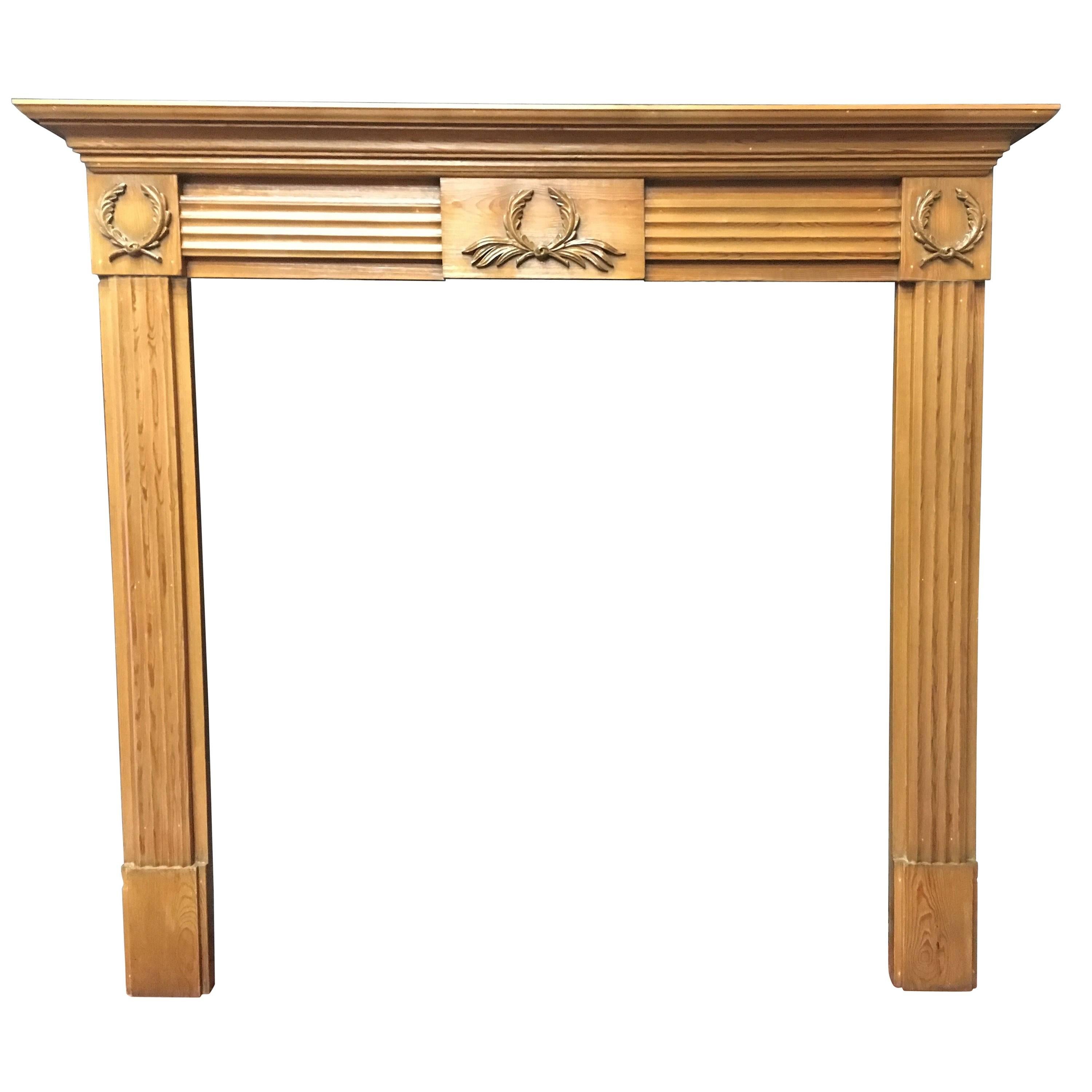 Aged Georgian Style Carved Pine Fireplace Surround.