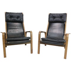 Pair of Yngve Ekstrom Armchairs in Black Leather and Wengé, 1960s