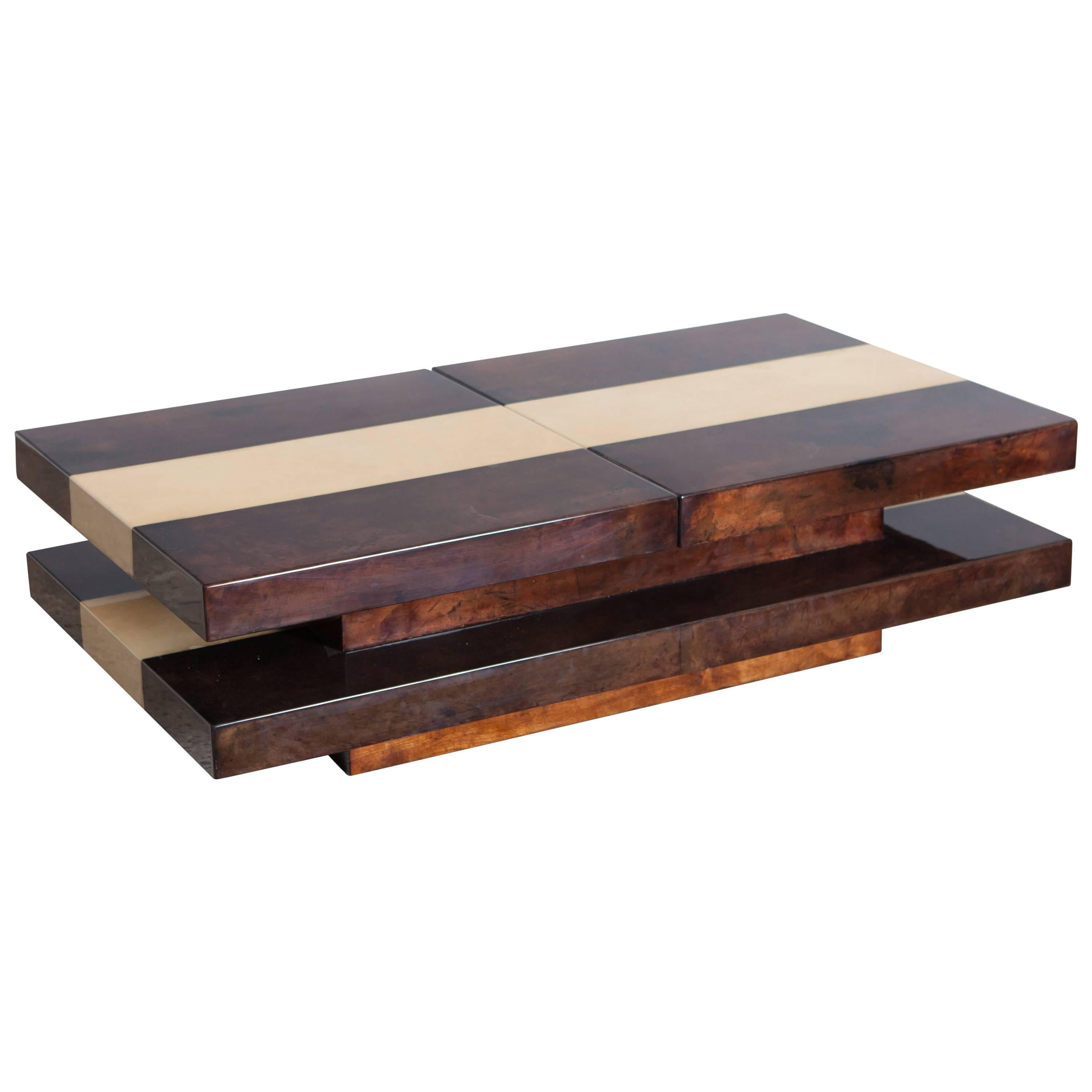 Aldo Tura two tier sliding coffee table with hidden bar