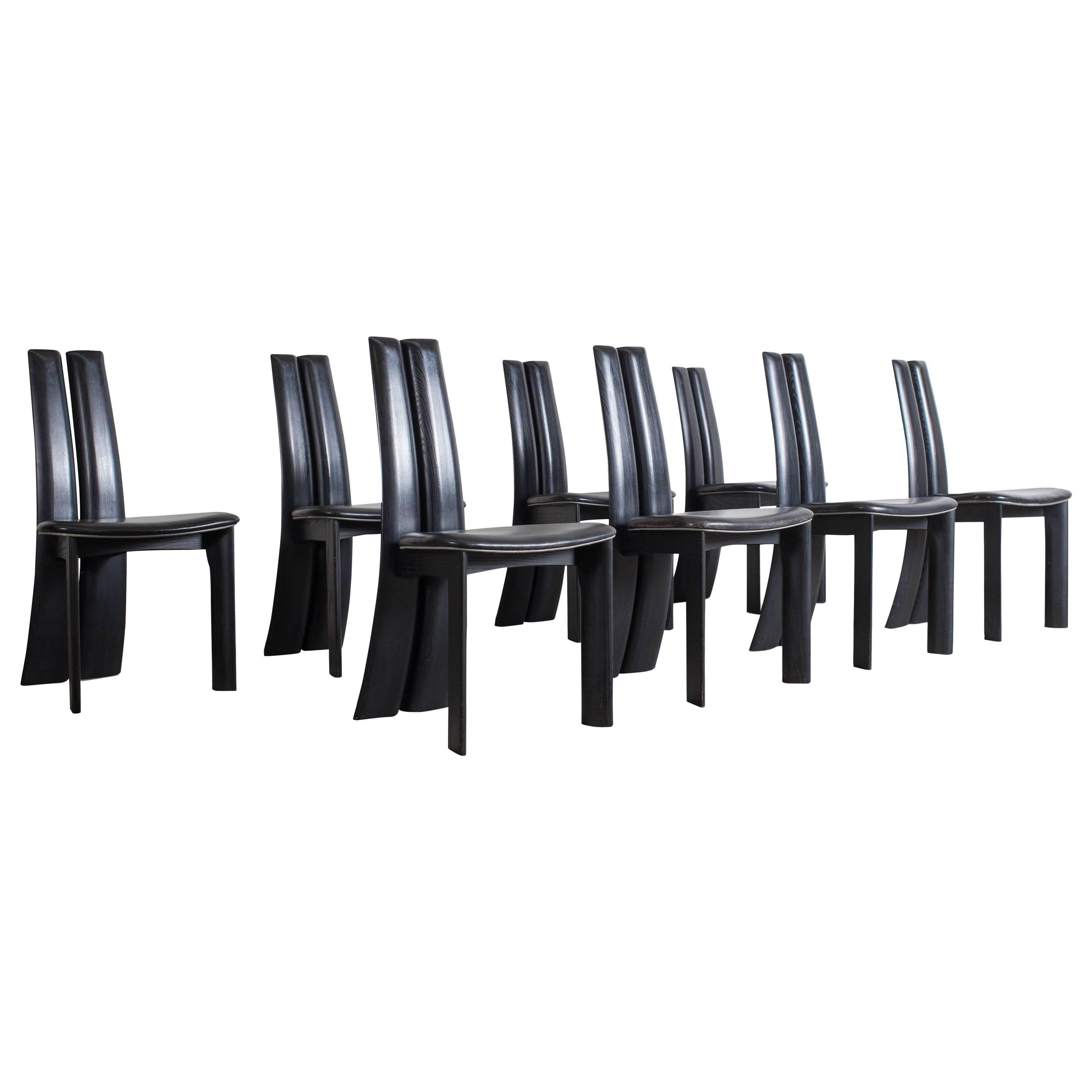 Mid-century modern sculptural ebonized dining chairs, set of eight