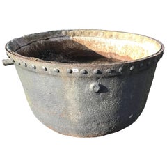 A LARGE LATE 19TH/EARLY 20TH CENTURY CAST IRON STUDDED Cauldron