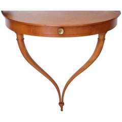 Dainty Demilune console from the 1950s