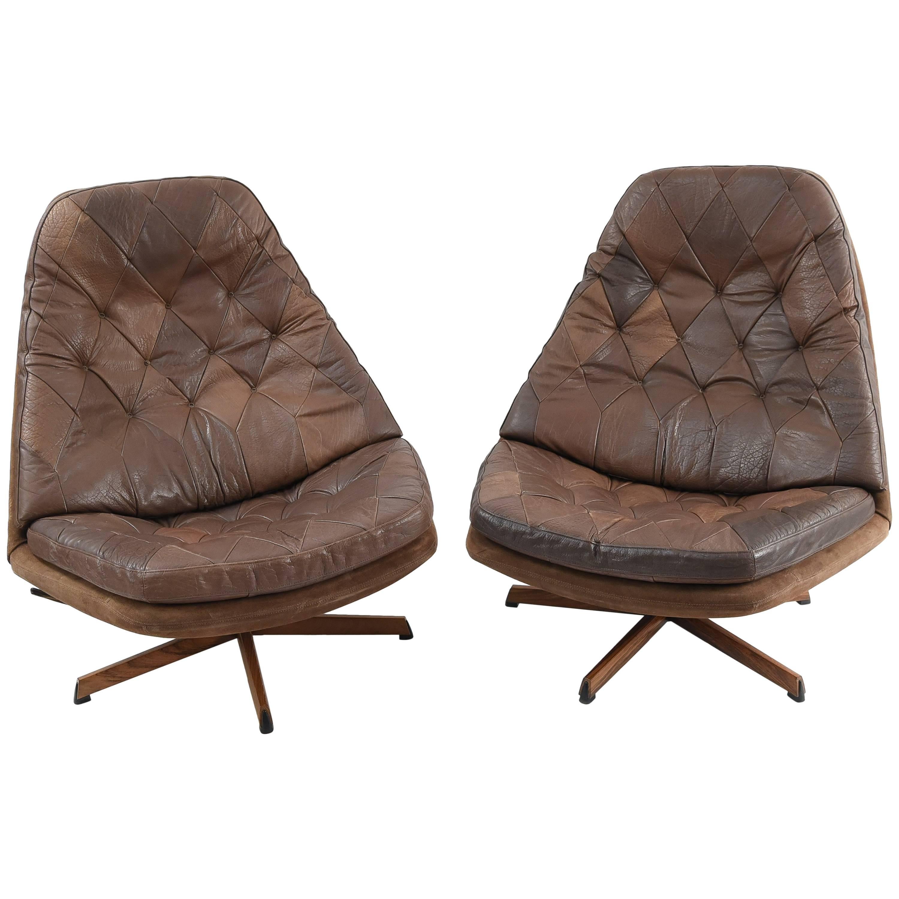 Pair of Madsen and Schubel Model Ms68 Leather Swivel High Back Lounge Chairs