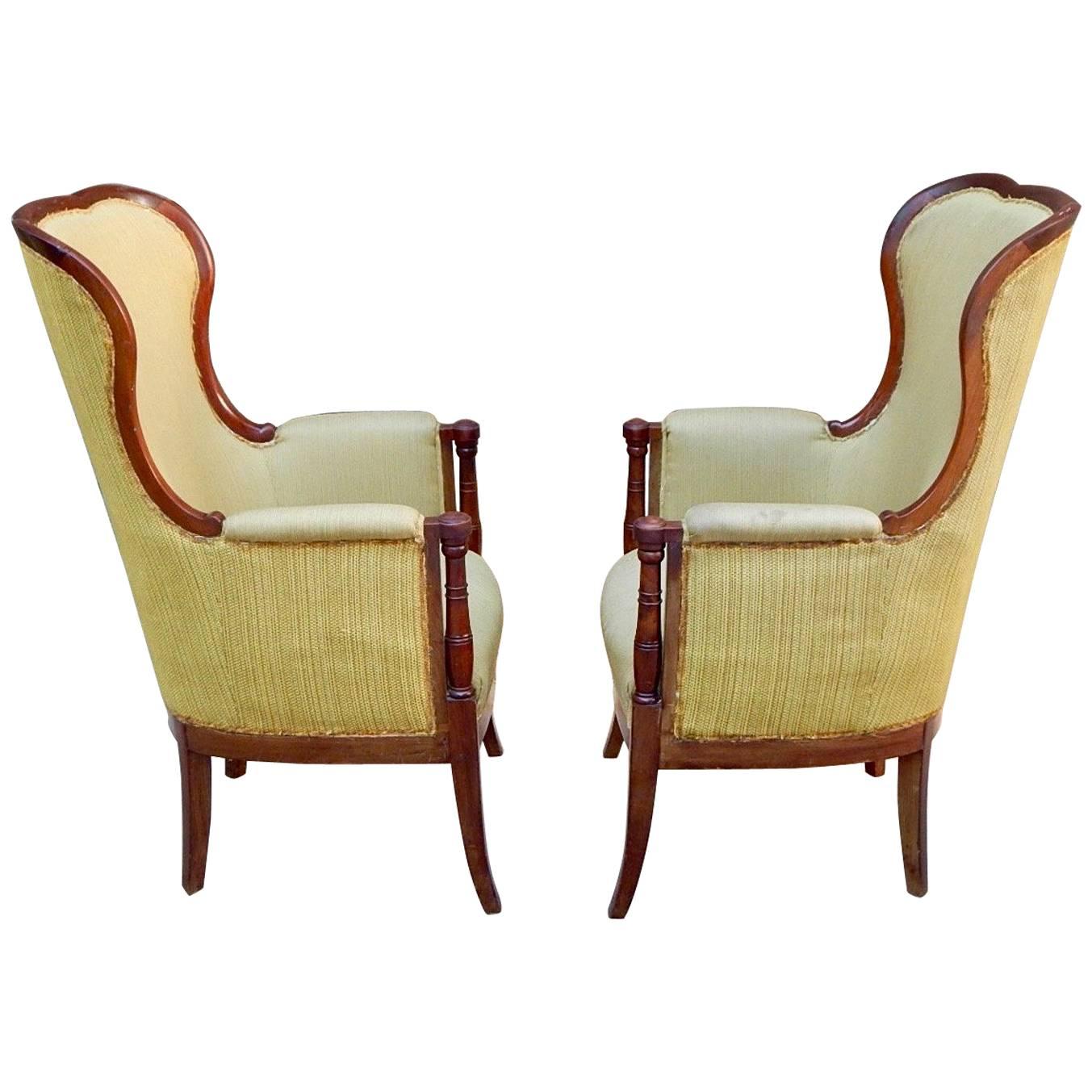 Pair of Swedish 1920's Exposed Frame Winged Back Chairs in Mahogany For Sale