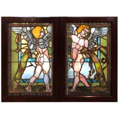 Pair of Antique Stained Glass Windows of Angels in Mahogany Frames for $3200
