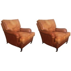 Vintage Pair of Distressed Leather Club Chairs by George Smith