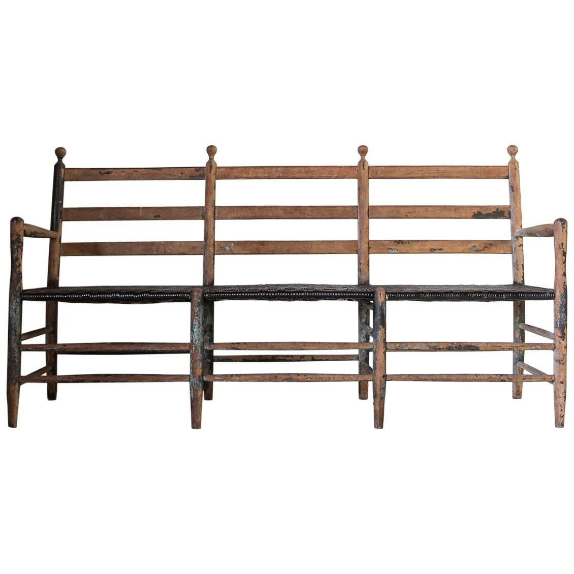 Rustic Ladder Back Bench with Spindle Details and Black Rush Seat
