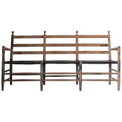 Rustic Ladder Back Bench with Spindle Details and Black Rush Seat