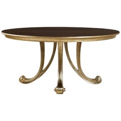 Table ronde Orcade en bois d'acajou massif et peinture dorée