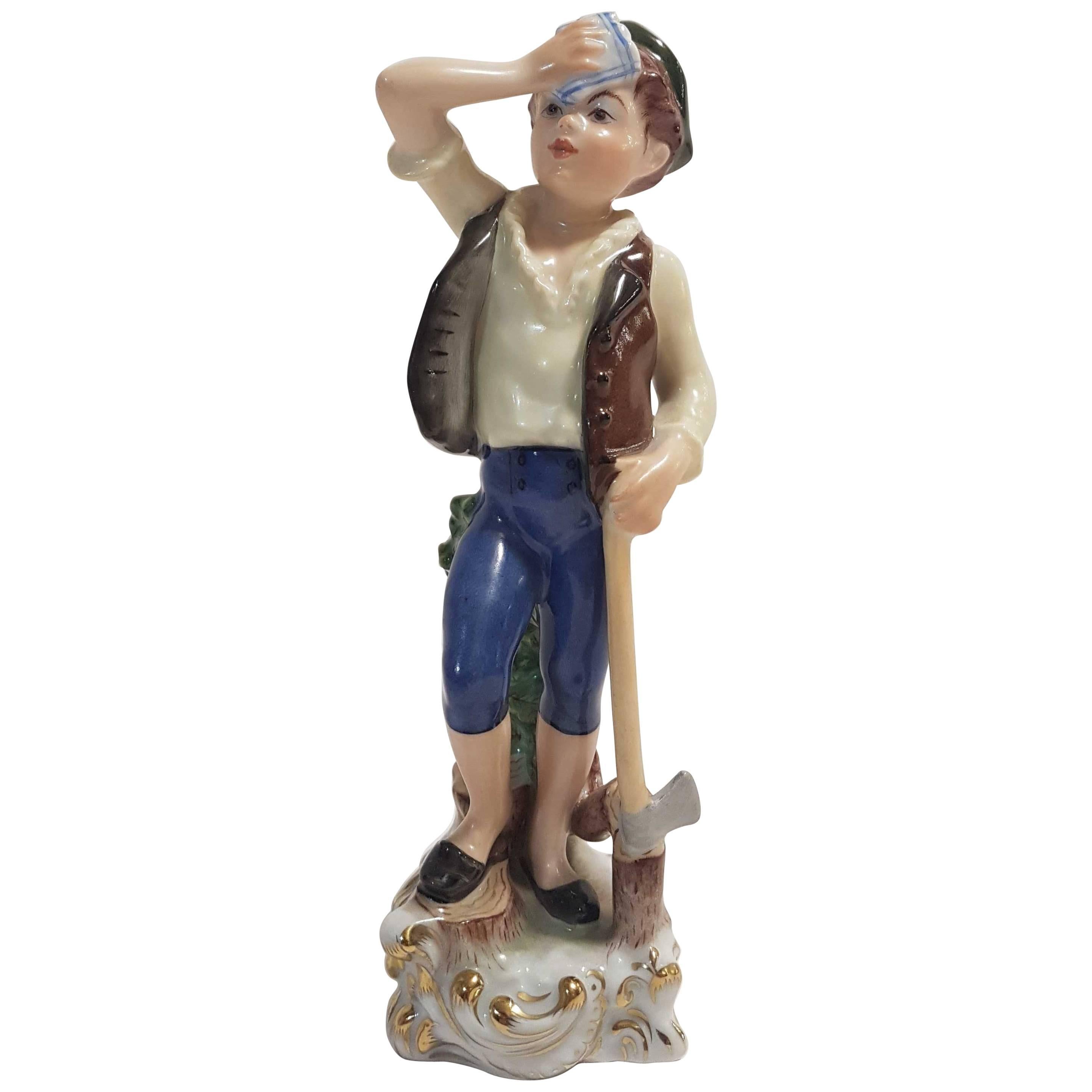 Herend Hand-Painted Hungarian Porcelain Figurine Representing a Woodcutter